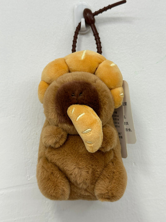 Capybara Pull String Croissant Plush Keychain